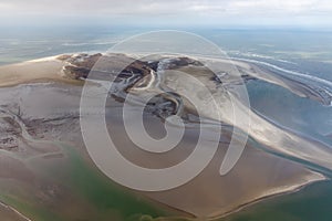 Aerial view Dutch island Rottumerplaat, coastline with mudflats and channels photo