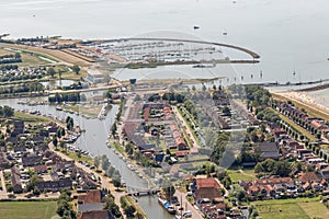 Aerial view Dutch village Stavoren at lake IJsselmeer with marina