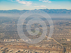 Aerial view of East Los Angeles, Bandini, view from window seat in an airplane