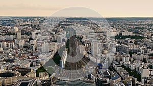 Aerial view of the eastern part of city center of Paris, France with rail tracks leading to train station Gare Montparnasse.