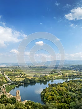 Ebro River passing through Miravet, Spain photo