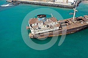 Aerial view. Ecological disaster. Boat stranded on the coast. Lanzarote, Spain, Europe. Lost Place