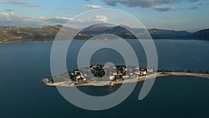 Aerial view of Egirdir lake, island and village. Landscape with a small turkish town among the lake under the mountain