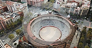 Aerial view of Eixample district and La Monumental, bullfighting arena of Barcelona, Catalonia, Spain