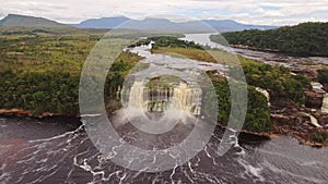 Aerial view of El Hacha waterfall at sunset. Canaima National Park