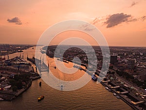 Aerial view of the Elbe River and ships in the city of Hamburg during sunset. Geramania in the summer