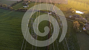 An aerial view of electricity pylons in rural Suffolk