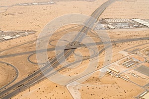 aerial view of an elevated interchange in a desert landscape