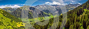 Aerial view of Elm village and Swiss mountains - Piz Segnas, Piz Sardona, Laaxer Stockli from Ampachli, Glarus, Switzerland, Europ photo