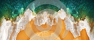 Aerial view on empty sandy tropical beach and ocean waves. Panoramic image photo