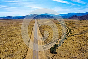 Aerial view of an endless road running through Death Valley, Drone photography