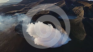 Aerial view of the eruption of ash clouds by Ebeko volcano. Northern Kurils