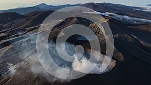 Aerial view of the eruption of ash clouds by Ebeko volcano. Northern Kurils