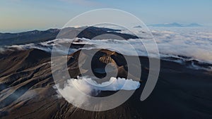 Aerial view of the eruption of ash clouds by Ebeko volcano. Northern Kurils