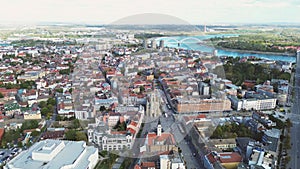 Aerial view of european city with architecture buildings and streets. Central square of small town cityscape, top view