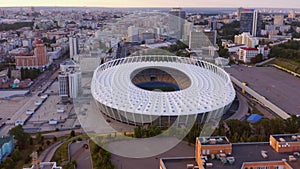 Aerial view of evening urban cityscape with olympic stadium.