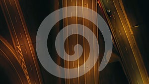 Aerial view of an expressway with little car traffic at night.