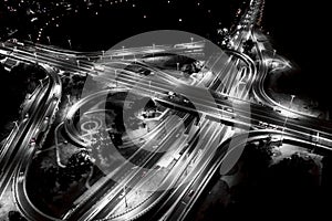 Aerial view Expressway motorway highway circus intersection at Night time Top view , Road traffic in city