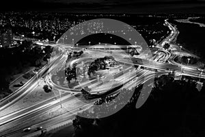 Aerial view Expressway motorway highway circus intersection at Night time Top view , Road traffic in city