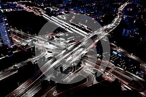 Aerial view Expressway motorway highway circus intersection at Night time Top view , Road traffic in city