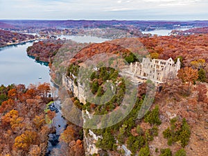 Aerial view of the fall color of Lake Ozark and the castle ruins