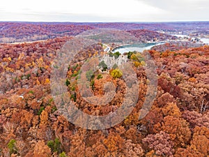 Aerial view of the fall color of Lake Ozark and the castle ruins