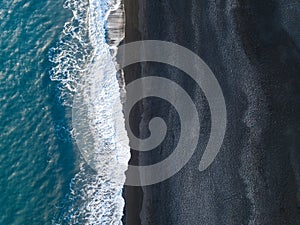 Aerial view of the famous Reynisfjara black beach in Vik, Iceland