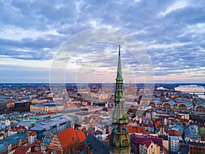 Aerial view of the famous St. Peters Cathedral in the old city of Riga on a cloudy day background