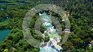 Aerial view of famous waterfalls Krka,  National Park in Croatia. Summer season, crystal clear turquoise water surrounded by green