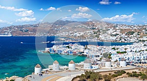 Aerial view through the famous windmills above Mykonos town, Cyclades