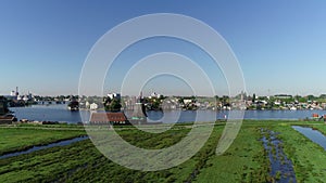 Aerial view of famous windmills of Zaanse Schans, Zaandam near Zaandijk and Amsterdam, Netherlands. Famous dutch places