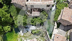 Aerial view of the fantastic waterfall of Orbaneja del Castillo, Spain.