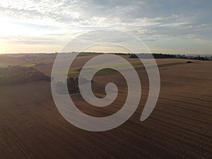 Aerial view of farmland during a marvelous sunset in Boarhunt, Hampshire, UK