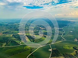 Aerial view of Farmlands and country roads somewhere in the midwest.