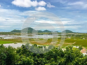 the aerial view of the field with mountain and sea near Thach Dong & x28;stone cave& x29;, Ha Tien city, Kien Giang, Vietnam