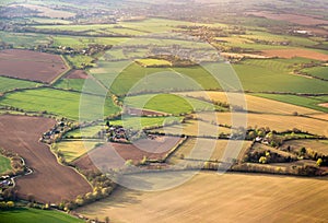 Aerial view on field plots in contrasting colours photo