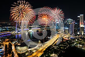 Aerial view of Fireworks celebration over Marina bay in Singapore. New year day 2018 or National day celebration at Singapore. As