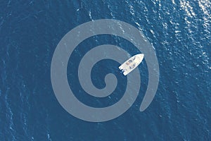 Aerial view fisherman on boat at the ocean. Top view beautiful seascape with the fishing boat. Aerial view fishing motor boat with