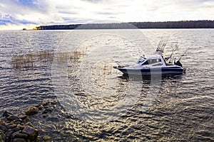 Aerial view fisherman on boat at the ocean. Top view beautiful seascape with the fishing boat. Aerial view fishing motor boat with