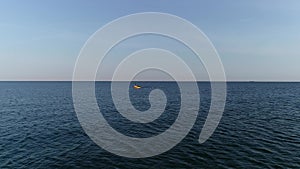 Aerial view of fishermenâ€™s boat sailing in the sea. Baltic sea and boat with fishing fishermen