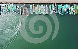 Aerial view of fishing boats at harbor