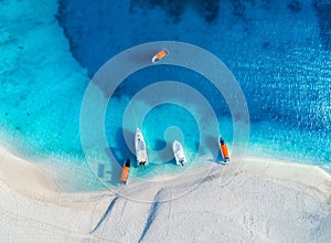 Aerial view of the fishing boats and yachts on tropical sea coast