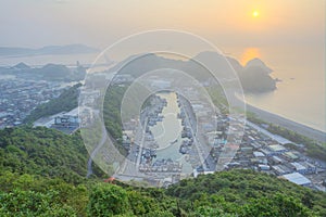Aerial view of a fishing village at dawn on northern coast of Taipei Taiwan