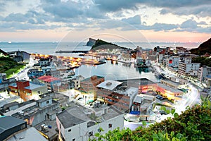 Aerial view of a fishing village at dawn on northern coast of Taipei Taiwan