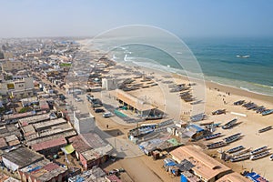 Aerial view of fishing village, pirogues fishing boats in Kayar, Senegal.  Photo made by drone from above. Africa Landscapes