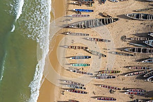 Aerial view of fishing village, pirogues fishing boats in Kayar, Senegal.  Photo made by drone from above. Africa Landscapes