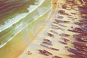 Aerial view of fishing village, pirogues fishing boats in Kayar, Senegal.  Photo made by drone from above. Africa Landscapes