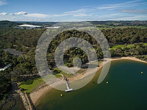 Aerial view of Flinders coastline and pier with moored boats. Me