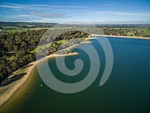 Aerial view of Flinders coastline and pier with moored boats. Me