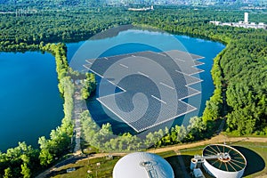 Aerial view of floating solar panels cell platform on the lake
